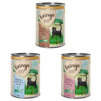 Trois boîtes Feringa 400 g pour chat adulte : Chicken with Pork & Beef, Chicken with Pork & Trout, Chicken with Pork & Turkey. Texte anglais visible sur chaque étiquette.