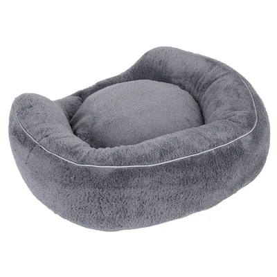 Grey, oval pet bed with soft padding and raised edge. Material: plush fabric.