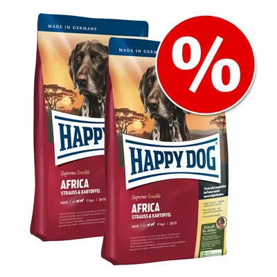Dwie torby karmy Happy Dog Supreme Sensible Africa Strauss & Kartoffel 11 kg, oznaczenie promocji procentowej na czerwonym tle. Widoczny napis: Made in Germany.