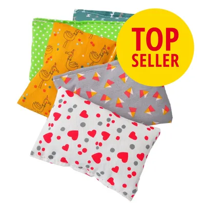 Useita kangaspusseja eri väreissä ja kuvioissa, päällä keltainen ympyrä, jossa punaisella teksti TOP SELLER