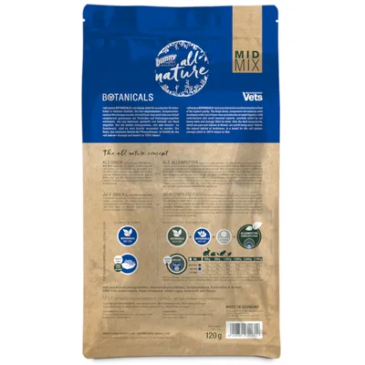 Embalagem de 120 g de Bunny all nature Botanicals MID MIX, com informações em inglês e alemão, vários selos visíveis e tabela de dosagem para coelhos e roedores. Fabricado na Alemanha. Embalagem de 120 g de Bunny all nature Botanicals MID MIX, com informações em inglês e alemão, vários selos visíveis e tabela de dosagem para coelhos e roedores. Fabricado na Alemanha.