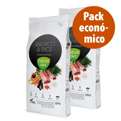 Duas embalagens de ração Natura Diet Iberico & Rice 12 kg, texto visível: 'Pack económico'. Imagem mostra ingredientes como carne, arroz e vegetais.