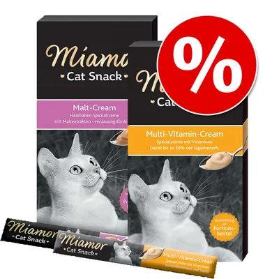 Miamor Cat Snack, Malt-Cream och Multi-Vitamin-Cream för katter. Förpackningar med tysk text: Spezialcreme mit Malzextrakten respektive mit Vitaminen. Röd rabatt-symbol med procenttecken.