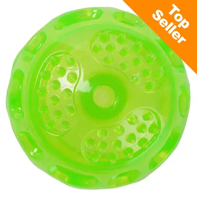 Balle verte en plastique avec surface à picots, étiquette orange en haut à droite avec texte « Top Seller » Balle verte en plastique avec surface à picots, étiquette orange en haut à droite avec texte « Top Seller »