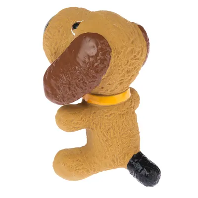 Dog toy made of rubber in the shape of a brown dog with a yellow collar and black tail.