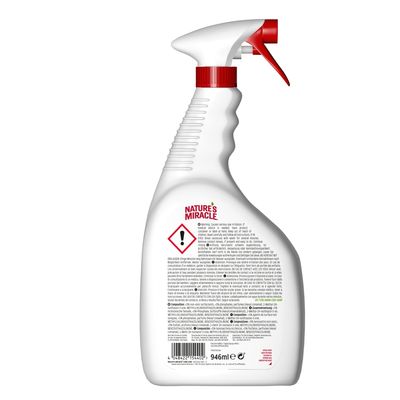 Nature's Miracle sprayfles, waarschuwingsteken met uitroepteken, tekst in meerdere talen, inhoud 946 ml zichtbaar op het etiket.