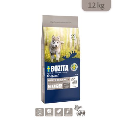 Sac de croquettes BOZITA Original Puppy & Junior XL with lamb, 12 kg. Analyse nutritionnelle : protéines 24 %, matières grasses 13 %. Texte en anglais et allemand visible sur l’emballage.