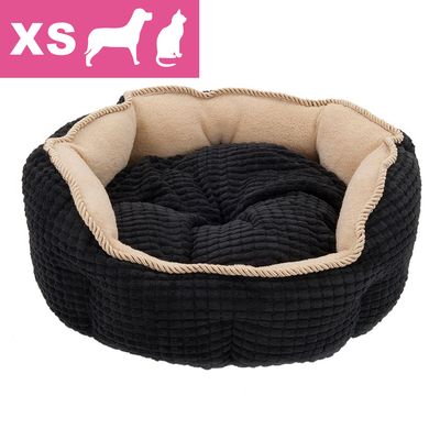 Sort og beige rund kæledyrsseng i stof, størrelse XS. Ikoner af hund og kat samt teksten 'XS' vises øverst til venstre.