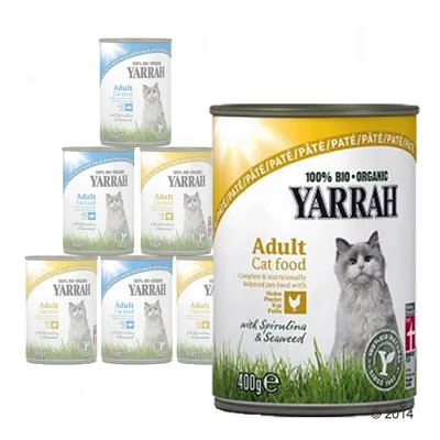 Yarrah 100% Bio-Organic Adult Cat food, dåse 400 g. Synlig tekst: med spirulina & seaweed. Flere dåser med blå og gul mærkning samt billede af kat på etiketten.