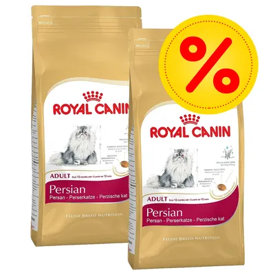 Två påsar Royal Canin Persian Adult torrfoder för perserkatt, synlig text: 'ADULT', 'Persian', stor gul rabatt-symbol med procenttecken Två påsar Royal Canin Persian Adult torrfoder för perserkatt, synlig text: 'ADULT', 'Persian', stor gul rabatt-symbol med procenttecken