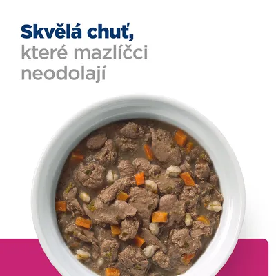 Miska s kúskami mäsa, mrkvy a obilnín v omáčke. Text v češtine: Skvělá chuť, které mazlíčci neodolají.