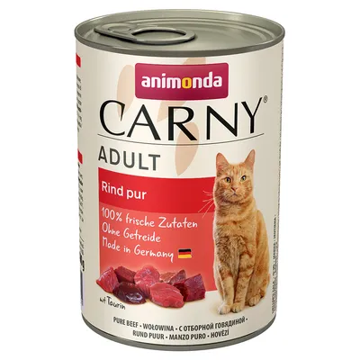 Tin labelled Carny Adult, pure beef. Text: 100% fresh ingredients, grain-free, made in Germany. Image shows beef pieces and a cat. Includes taurine.