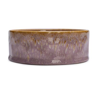 Ciotola in ceramica con sfumatura marrone-lilla, rotonda e smaltata.