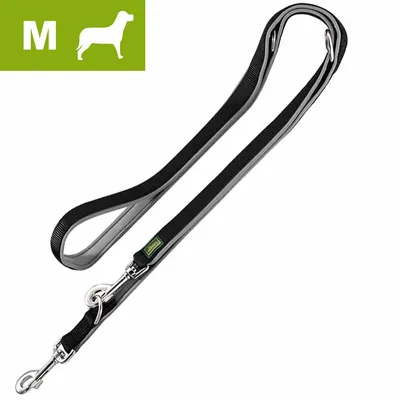 Adjustable black and grey lead with metal clips, shown in medium size with a silhouette icon indicating suitability for medium-sized animals.