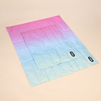 TIAKI Regenbogen Kühlmatte