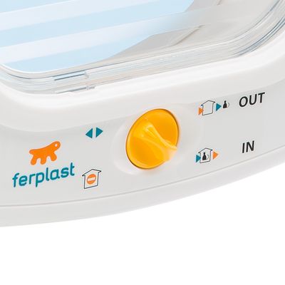 Ferplast cat flap with yellow rotary knob and symbols for entry and exit settings. Labels: IN, OUT, house symbol and arrows.