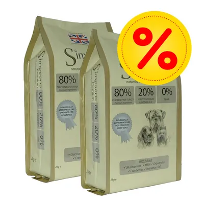 Two bags showing 80% chicken, fish, turkey, 20% fruit, vegetables, botanicals, 0% grain. Biologically appropriate dry food for adult dogs. Special offer symbol in corner.