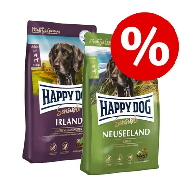 To poser Happy Dog Sensible hundefoder: Irland (lilla pose, laks & kanin) og Neuseeland (grøn pose, lam), begge 11 kg. Rød procenttegn angiver tilbud.