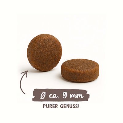 Zwei runde Futterstücke, Durchmesser ca. 9 mm, Text: PURER GENUSS!
