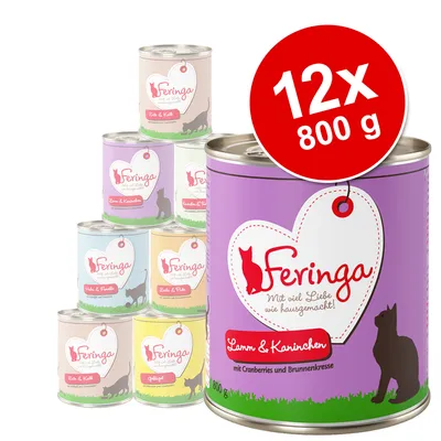 Feringa, pack de 12 latas de 800 g cada. Latas visíveis com rótulos coloridos e nomes dos sabores em alemão, incluindo 'Lamm & Kaninchen'. Texto promocional: 12x 800 g.