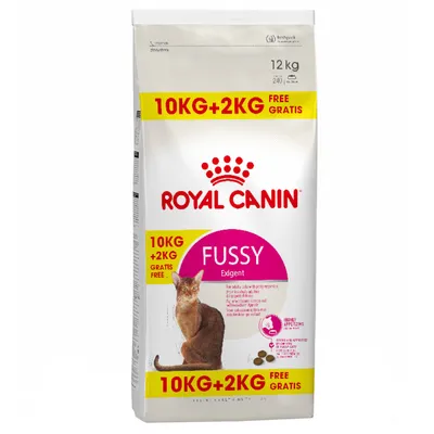 Royal Canin Fussy Exigent, 12 kg, 10 kg + 2 kg offerts. Illustration d’un chat et de croquettes pour chat. Indications sur la saveur et la stimulation de l’appétit visibles.