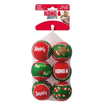Lot de 6 balles pour chien KONG SqueakAir, motifs rouges et verts, emballées dans un filet. Texte visible : SQUEAKS, COUINE, KONG SqueakAir.