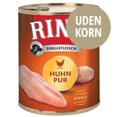Rinti Singlefleisch dåse med teksten 'Huhn Pur', '1 Protein Single getreidefrei' og mærkat 'UDEN KORN'. Billede af kyllingekød på etiketten.