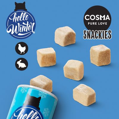 Cosma Pure Love Snackies. Snack liofilizzati per gatti con pollo o coniglio. Design Hello Winter sulla confezione.