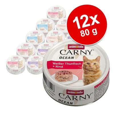 animonda Carny Ocean kattemad, smag: Weißer Thunfisch + Rind. Pakke med 12 dåser à 80 g. Synlige dåser med forskellige varianter og en rød cirkel med teksten '12x 80 g'. animonda Carny Ocean kattemad, smag: Weißer Thunfisch + Rind. Pakke med 12 dåser à 80 g. Synlige dåser med forskellige varianter og en rød cirkel med teksten '12x 80 g'.