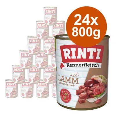 Zestaw 24 puszek Rinti Kennerfleisch mit Lamm, każda po 800 g. Widoczna etykieta: bez zbóż, kawałki mięsa i warzyw na opakowaniu.