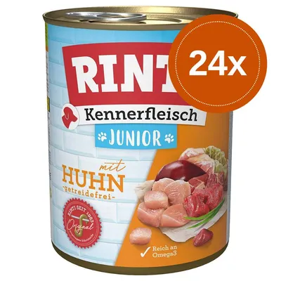 RINTI Kennerfleisch Junior mit Huhn, getreidefrei, 24x. Widoczne kawałki mięsa, napis: „Reich an Omega3”, „Original seit 1983”. Opakowanie puszki dla młodych psów.