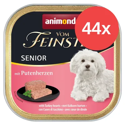 Animonda Vom Feinsten Senior mit Putenherzen, pack de 44 unidades. Imagen de la lata con perro pequeño blanco y comida húmeda en trozos. Texto visible en varios idiomas. Animonda Vom Feinsten Senior mit Putenherzen, pack de 44 unidades. Imagen de la lata con perro pequeño blanco y comida húmeda en trozos. Texto visible en varios idiomas.