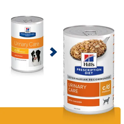 Duas latas de Hill's Prescription Diet Urinary Care c/d Multicare with Chicken para cães, mostrando mudança de embalagem. Texto visível: VETERINARIAN RECOMMENDED, DOG FOOD.