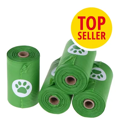 Cuatro rollos de bolsas verdes con símbolo de huella, etiqueta visible: TOP SELLER en círculo amarillo y rojo.