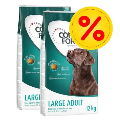 2 sacos de pienso para perros adultos grandes, marca visible 'COMFOR', 12 kg cada uno. Imagen incluye símbolo de porcentaje en círculo amarillo indicando oferta o descuento. 2 sacos de pienso para perros adultos grandes, marca visible 'COMFOR', 12 kg cada uno. Imagen incluye símbolo de porcentaje en círculo amarillo indicando oferta o descuento.