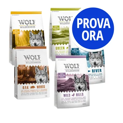 Confezioni di crocchette Wolf of Wilderness vari gusti: Oak Woods, Green Fields, Wild Hills, River. Cerchio blu con testo: PROVA ORA. Confezioni di crocchette Wolf of Wilderness vari gusti: Oak Woods, Green Fields, Wild Hills, River. Cerchio blu con testo: PROVA ORA.