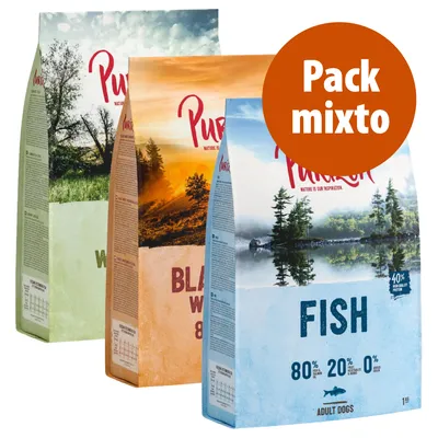 Tres sacos de pienso Purizon para perros, variedades Wild, Black Angus y Fish. Texto visible: 'Pack mixto', 'FISH', '80 %', '20 %', '0 %', 'ADULT DOGS'.