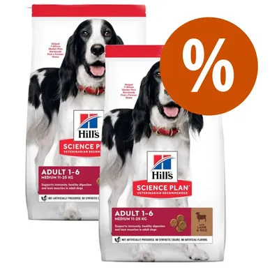 Due confezioni di Hill's Science Plan Adult 1-6 Medium 11-25 kg con agnello e riso, offerta promozionale indicata dal simbolo percentuale arancione.
