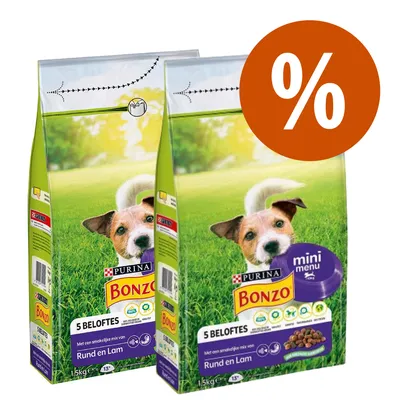 Due confezioni di crocchette per cani Purina Bonzo, testo visibile: 5 Beloftes, Rund en Lam, 1,5 kg. Simbolo percentuale bianco su sfondo arancione in alto a destra.