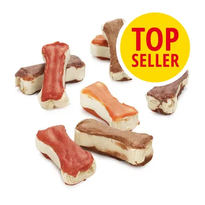Snack a forma di osso in diversi colori, etichetta gialla con testo rosso 'TOP SELLER' visibile nell'immagine.