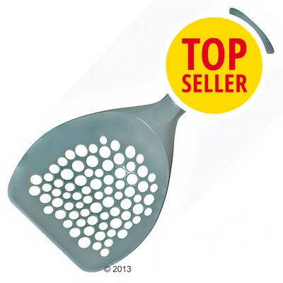 Plastová lopatka s kulatými otvory, žlutý kruh s červeným textem TOP SELLER v pravé horní části obrázku.