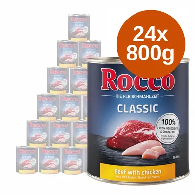 Rocco Classic Beef with chicken, 24 puszki po 800 g. Widoczne opakowanie z napisem 100% fresh ingredients & grain-free. Na etykiecie zdjęcia mięsa wołowego i kurczaka.
