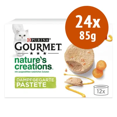 Purina Gourmet nature's creations Dampfgegarte Pastete, confezione da 24x85g, immagine di paté con carote e scritta '12x' su scatola. Testo tedesco visibile sull'imballaggio.
