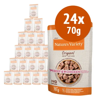 Multipack 24x70g Nature's Variety Original Paté Beef & Chicken per adulti, senza cereali, visibile la confezione con pezzi di carne. Testo: NO GRAIN, NET WEIGHT 70g.