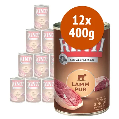 12 lattine da 400 g di Rinti Singlefleisch Lamm Pur, visibile scritta '1 Protein Single getreidefrei' sulla confezione. Immagine di carne d'agnello sull'etichetta.
