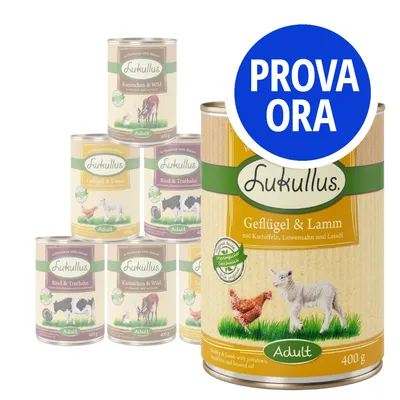 Scatolette Lukullus Adult 400 g, vari gusti visibili: Geflügel & Lamm, Kaninchen & Wild, Rind & Truthahn. Etichetta grande: Geflügel & Lamm con patate, tarassaco e olio di lino. Testo: PROVA ORA.