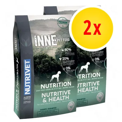 Lot de 2 sacs NUTRIVET INNE PET FOOD Nutrition pour chien adulte 2 à 7 ans, 80 % ingrédients d’origine animale, 20 % fruits/légumes/plantes, 0 % céréales ajoutées, texte en anglais/français visible.