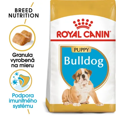 Royal Canin Puppy Bulldog, granula vyrobená na mieru, podpora imunitného systému. Balenie s obrázkom šteniatka buldoga a modrým štítom s nápisom Bulldog.