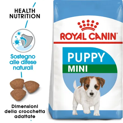 Royal Canin Puppy Mini, sostegno alle difese naturali, dimensioni della crocchetta adattate, confezione con immagine di cane e crocchette visibili. Royal Canin Puppy Mini, sostegno alle difese naturali, dimensioni della crocchetta adattate, confezione con immagine di cane e crocchette visibili.