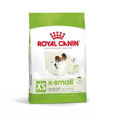 Royal Canin x-small adult, tamaño XS hasta 4 kg, para perros adultos mayores de 10 meses. Texto visible: Healthy immune system, optimal health support. Imagen de perro pequeño en el envase.